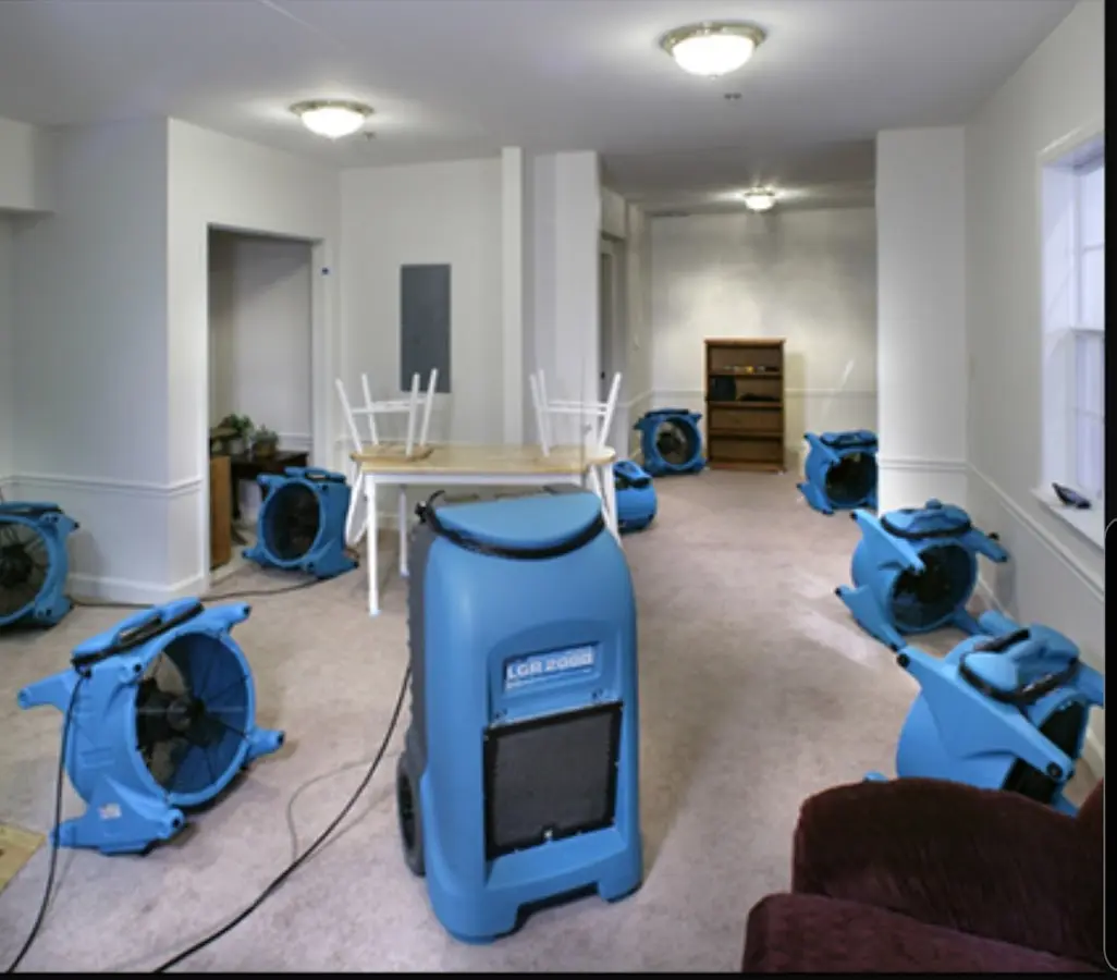Air movers and dehumidifier setup for Water Extraction & Removal in Converse